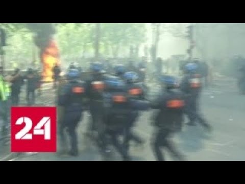 "Желтые жилеты" бунтуют в Париже: ранены 14 полицейских - Россия 24 - (видео)