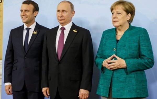 Меркель, Макрон и Путин обсудили реализацию минских соглашений